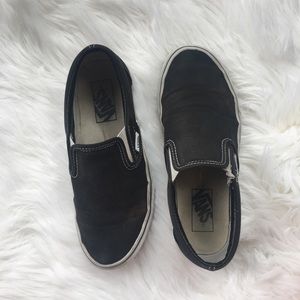 Vans black slip-ons